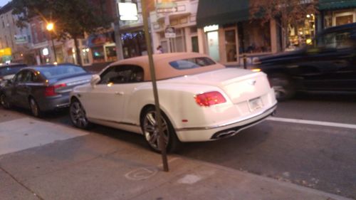 Car on city street at night