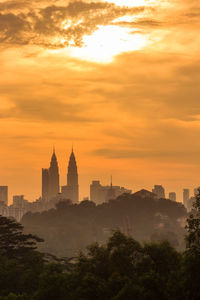 View of buildings against sky during sunset