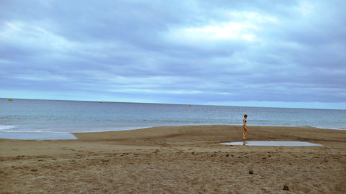 Scenic view of beach against sky