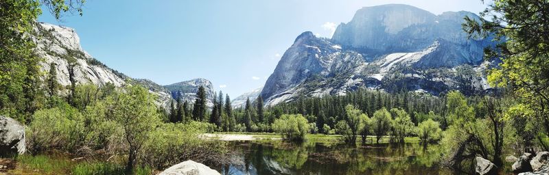 Panoramic view of lake and mountains against sky