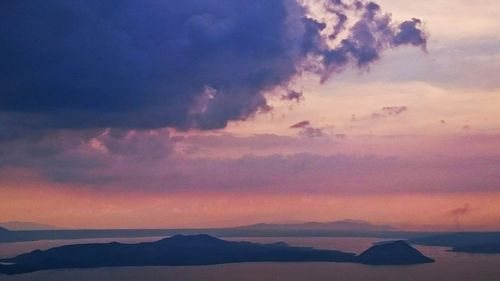 Scenic view of sea against cloudy sky