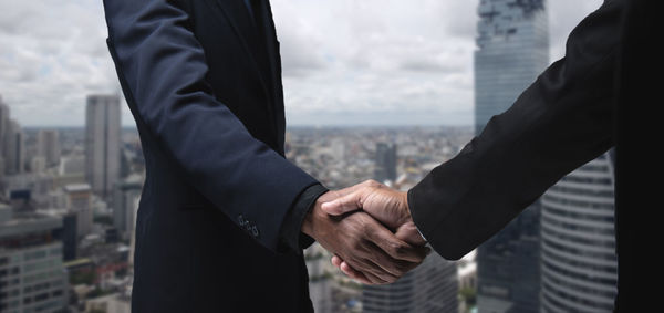 Business people shaking hands