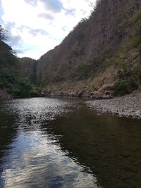Scenic view of river against sky