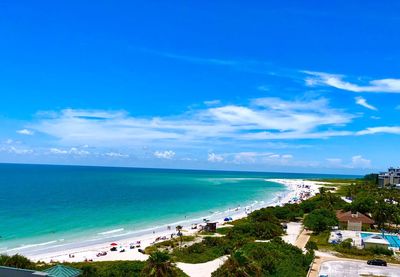 High angle view of beach against blue sky