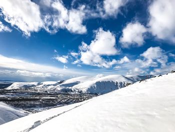 Snow covered mountain against sky