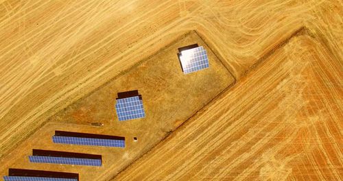 High angle view of information sign on wooden floor in house