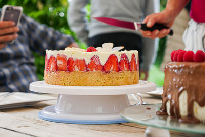 Midsection of cake on table