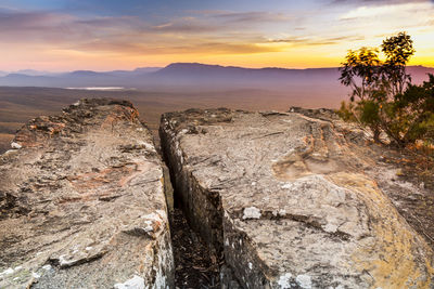 Scenic view of mountains against sky during sunset