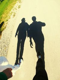 High angle view of men standing on road