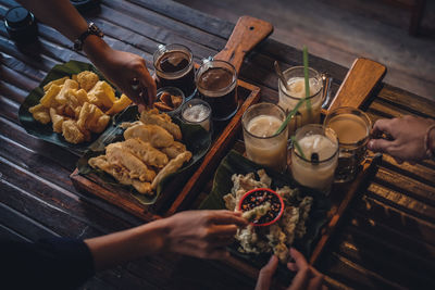 High angle view of people on table