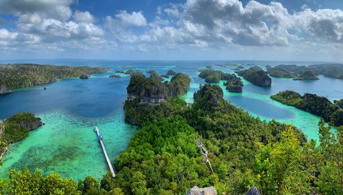 High angle view of puncak harapan against sky in misool island raja ampat indonesia 