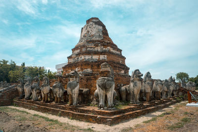 Statue of temple against sky