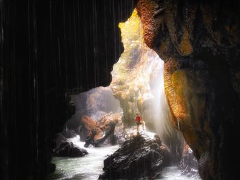 View of waterfall in cave