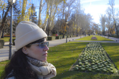 Woman in snow covered park