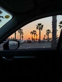 Cars on road seen through car windshield