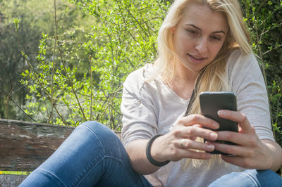 Woman using smart phone