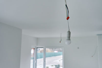 Low angle view of hanging light