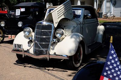 Vintage car parked on street in city