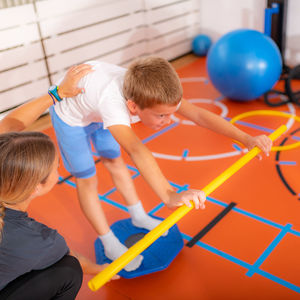 Balance exercises for children, using balancing disks