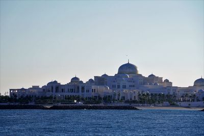 White marble palace at sunset time