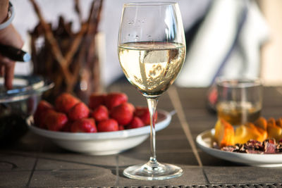 Close-up of wine in glass on table