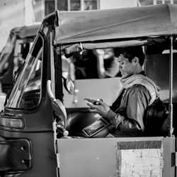 Man working in car