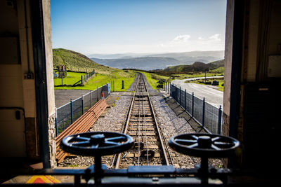 View of train passing through window