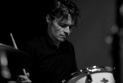 Man playing at music concert