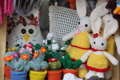 Close-up of knitted toys in market