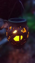 Close-up of illuminated lantern at night