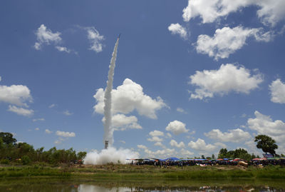 Rocket launch on landscape