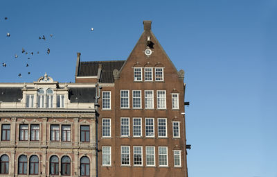 Low angle view of building against clear sky