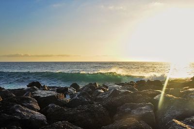 Scenic view of sea against sky during sunset