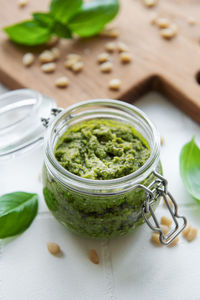 Fresh made pesto sauce. green basil pesto. ingredient for pesto sauce 