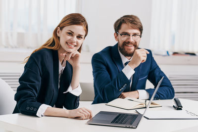 Portrait of smiling young couple