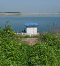 Built structure on shore against sky