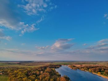 Scenic view of landscape against blue sky