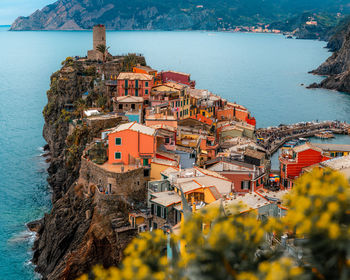 High angle view of townscape by sea