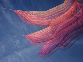 Low angle view of rainbow against sky