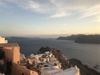 High angle view of townscape by sea