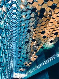 Low angle view of glass ceiling in building