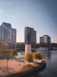 Buildings in city against sky