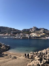 Scenic view of sea against clear blue sky