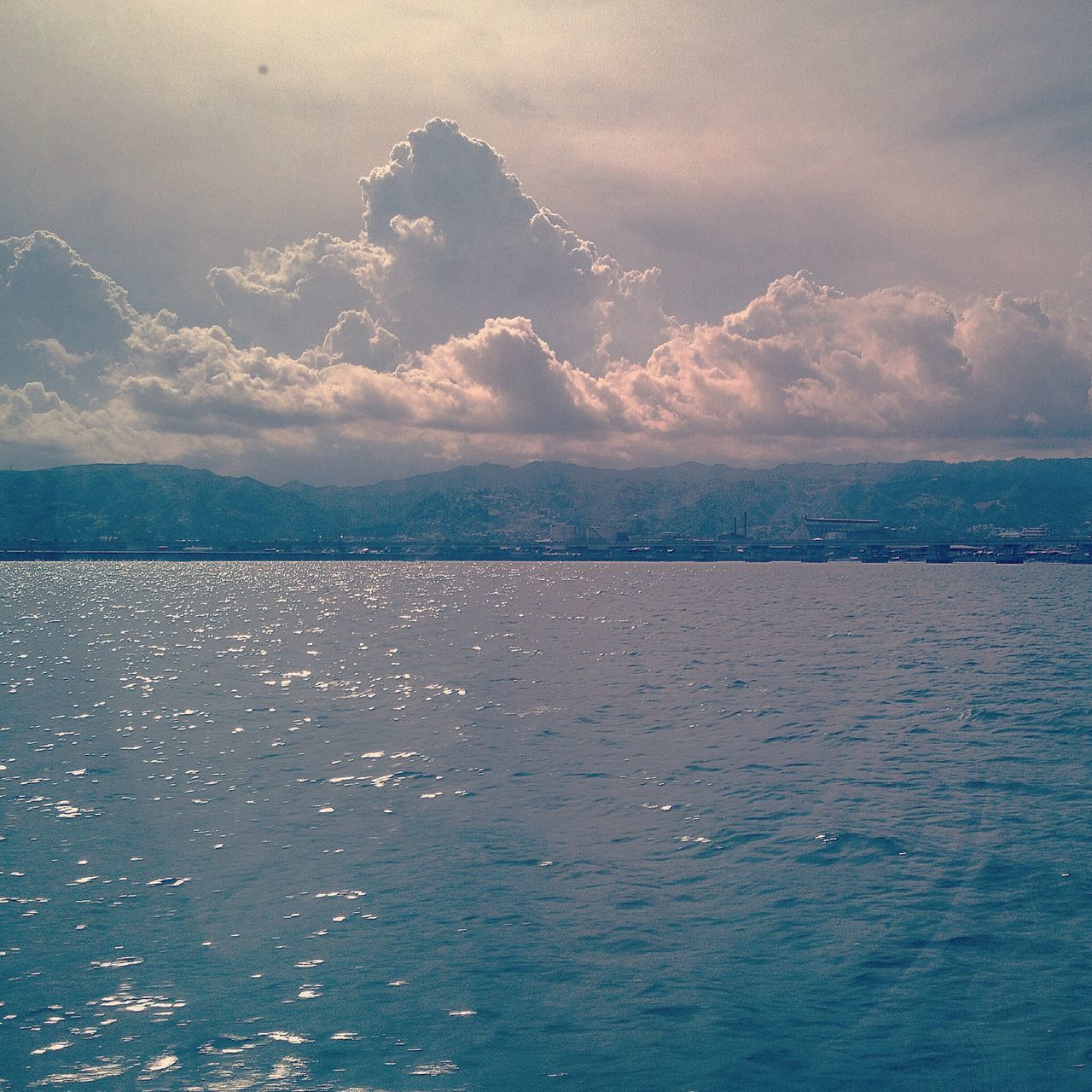 water, sea, sky, scenics, tranquil scene, tranquility, beauty in nature, waterfront, horizon over water, cloud - sky, nature, idyllic, cloud, rippled, cloudy, blue, seascape, outdoors, calm, no people