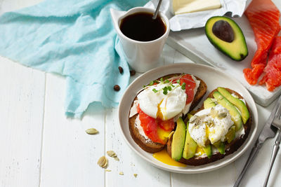 High angle view of breakfast served on table