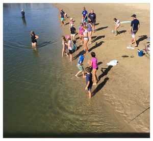 People enjoying at beach