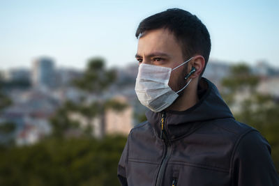 Man wearing pollution mask