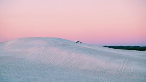 Scenic view of desert against clear sky