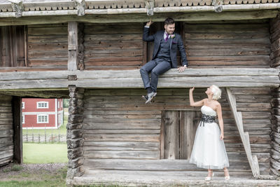 Smiling bride outside barn