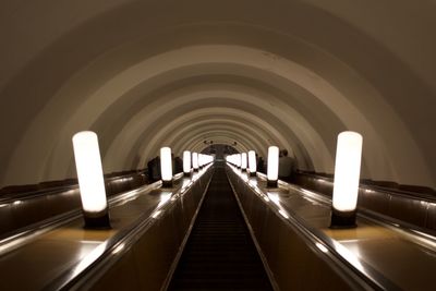 View of escalator in tunnel of metro